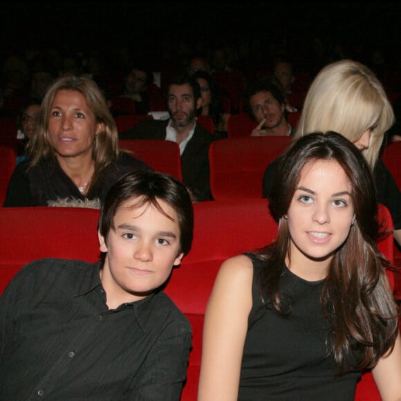 Alain-Fabien Delon, Anouchka Delon et Alain Delon - Première d'"Astérix aux Jeux Olympiques" au cinéma Gaumont Champs Elysées