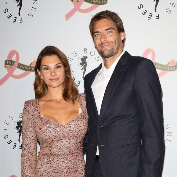 Que son père a accueilli avec sa compagne Alice Detollenaere
Camille Lacourt et sa compagne Alice Detollenaere (Miss Bourgogne 2010) - Photocall du 4ème gala de charité de l'association "Les Bonnes Fées" à l'occasion de la campagne mondiale "Octobre Rose" à l'hôtel Peninsula, Paris le 5 octobre 2023. © Coadic Guirec/Bestimage