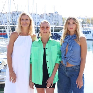 Alexandra Lamy, Audrey Lamy et Chloé Jouannet lors du photocall de la série "Killer Coaster" lors de la 25ème édition du Festival de la fiction de la Rochelle, France, le 13 septembre 2023. © Denis Guignebourg/BestImage 