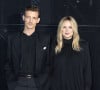 Sur l'une des photographies, on découvre même un coeur dessiné sur l'une des fenêtres de leur wagon, symbole de son amour pour l'acteur 
Niels Schneider et sa compagne Virginie Efira - Photocall du défilé Saint Laurent Womenswear Printemps/été 2024 dans le cadre de la Fashion week de Paris le 26 septembre 2023 à Paris.