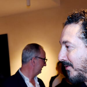 Exclusif - François-Xavier Demaison et Guillaume Gallienne à l'inauguration du Flagship Eluxtravel, un nouveau salon de voyage design et lumineux à Paris le 14 novembre 2024. © Rachid Bellak / Bestimage