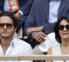 C'est donc dans les bras du jeune humoriste suisse qu'elle s'est montrée en public en juin 2022. Florence Foresti et son compagnon Alexandre Kominek - People dans les tribunes lors des Internationaux de France de Tennis de Roland Garros 2022 à Paris le 29 mai 2022. © Cyril Moreau/Bestimage 