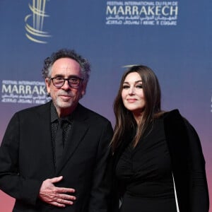 Monica Bellucci a fait sensation. Vêtue d'une longue robe noire sublimée par une cape, l'actrice italienne a foulé le tapis rouge au bras de Tim Burton, son compagnon...
Tim Burton et Monica Bellucci sur le tapis rouge de la cérémonie d'ouverture du 21e Festival international du film de Marrakech, à Marrakech, au Maroc, le 29 novembre 2024. Photo par Aurore Marechal/ABACAPRESS.COM