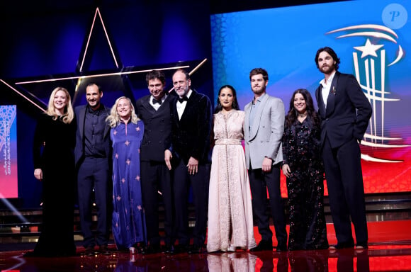 Lors de la cérémonie d'ouverture, le tapis rouge s'est transformé en un véritable défilé de mode, où se sont croisées des figures emblématiques comme Monica Bellucci, Tim Burton et Virginie Efira...
Le Jury, Virginie Efira, Ali Abbasi, Patricia Arquette, Santiago Mitre, Luca Guadagnino, Nadia Kounda, Andrew Garfield, Zoya Akhtar, Jacob Elordi lors de la cérémonie d'ouverture et à la projection du film "L'Ordre" lors du 21ème Festival international du film de Marrakech. © Dominique Jacovides/Bestimage 