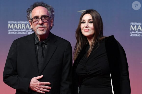 Tim Burton et Monica Bellucci sur le tapis rouge de la cérémonie d'ouverture du 21e Festival international du film de Marrakech, à Marrakech, au Maroc, le 29 novembre 2024. Photo par Aurore Marechal/ABACAPRESS.COM