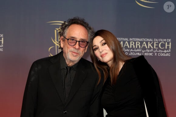 Tim Burton et Monica Bellucci au photocall de la cérémonie d'ouverture et à la projection du film "L'Ordre" lors du 21ème Festival international du film de Marrakech, le 29 novembre 2024j à Marrakech, Maroc. © Dominique Jacovides/Bestimage 