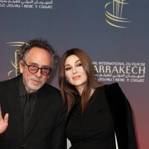 Tim Burton et Monica Bellucci au photocall de la cérémonie d'ouverture et à la projection du film "L'Ordre" lors du 21ème Festival international du film de Marrakech, le 29 novembre 2024j à Marrakech, Maroc. © Dominique Jacovides/Bestimage 