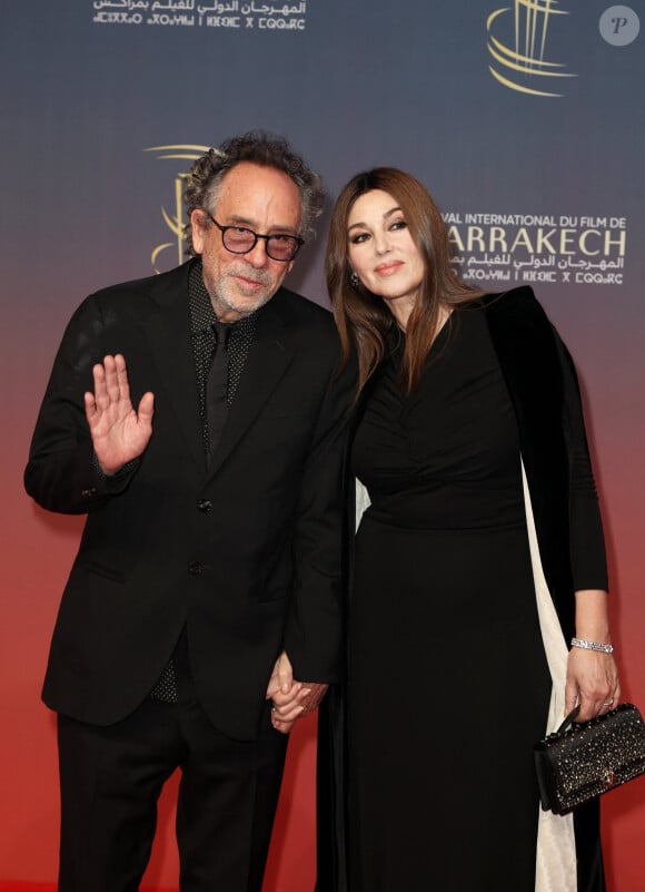 Tim Burton et Monica Bellucci au photocall de la cérémonie d'ouverture et à la projection du film "L'Ordre" lors du 21ème Festival international du film de Marrakech, le 29 novembre 2024j à Marrakech, Maroc. © Dominique Jacovides/Bestimage 