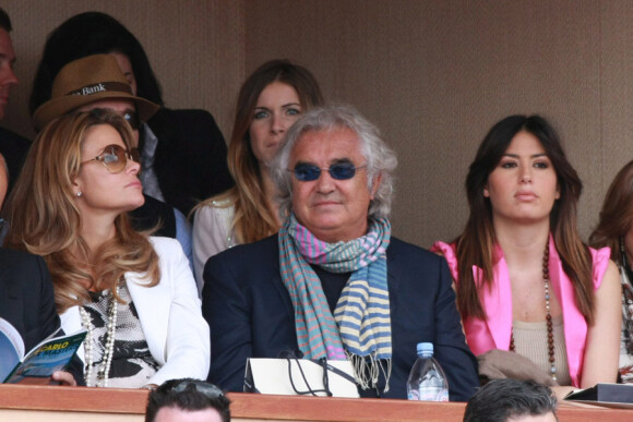 Flavio Briatore et sa femme Elisabetta, derrière eux, Max Biaggi et sa fiancée Eleonora, lors de la demi-finale des Masters de Monte-Carlo le 17 avril 2010