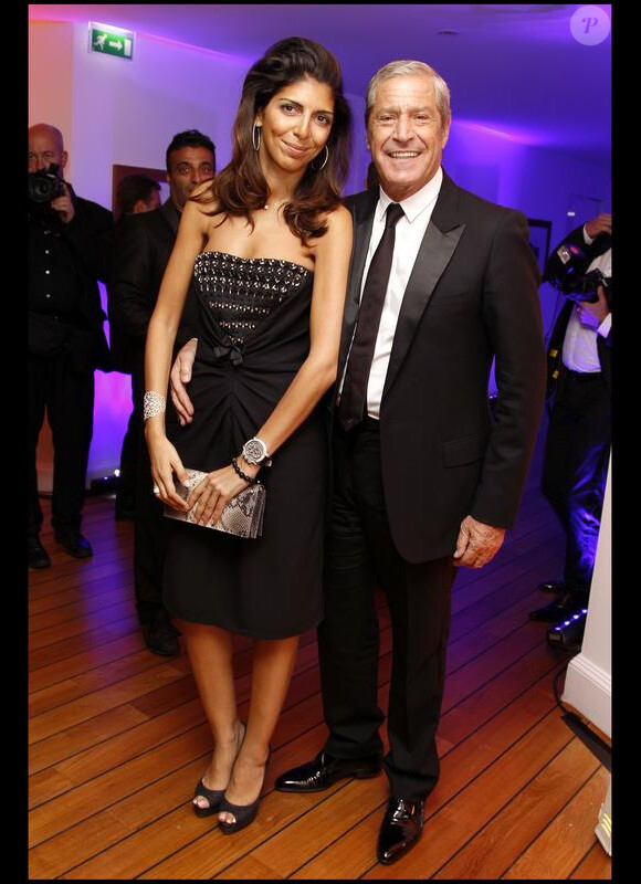 Jean-claude Darmon et sa compagne Hoda Roche lors du dîner Dior au Cap d'Antibes, le 21 mai 2010