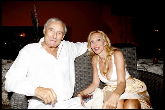Gérard de Villiers et sa compagne Sylvie Elias lors de la soirée Monica Baccardi à l'Hôtel Byblos à Saint-Tropez le 27 juillet 2010