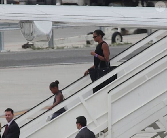 Michelle Obama et sa fille Sasha arrivant à l'aéroport de Malaga le 4 août 2010