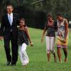 Barack Obama, sa femme Michelle, et leurs filles Malia et Sasha arrivent à la Maison Blanche