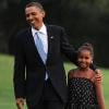 Barack Obama, sa femme Michelle, et leurs filles Malia et Sasha arrivent à la Maison Blanche