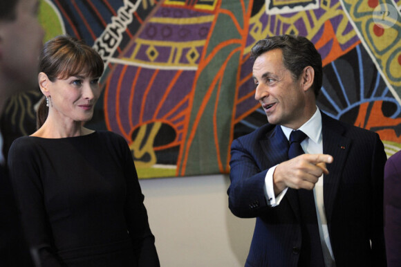 Carla Bruni et Nicolas Sarkozy lors d'une rencontre privée au quartier général de l'ONU à New York avec la chancelière allemande le 20 septembre 2010
