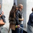 Wesley Sneijder, star de l'Inter, et Yolanthe Cabau van Kasbergen, sa femme depuis juillet 2010 : des emplettes milanaises non dénuées de tendresse...