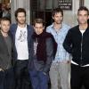 Robbie Williams et Take That quittent les studios de Radio 1 à Londres, le 27 octobre 2010