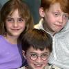 Les tout jeune trio Emma Watson, Daniel Radcliffe et Rupert Grint à Londres le 23 Aout 2001.