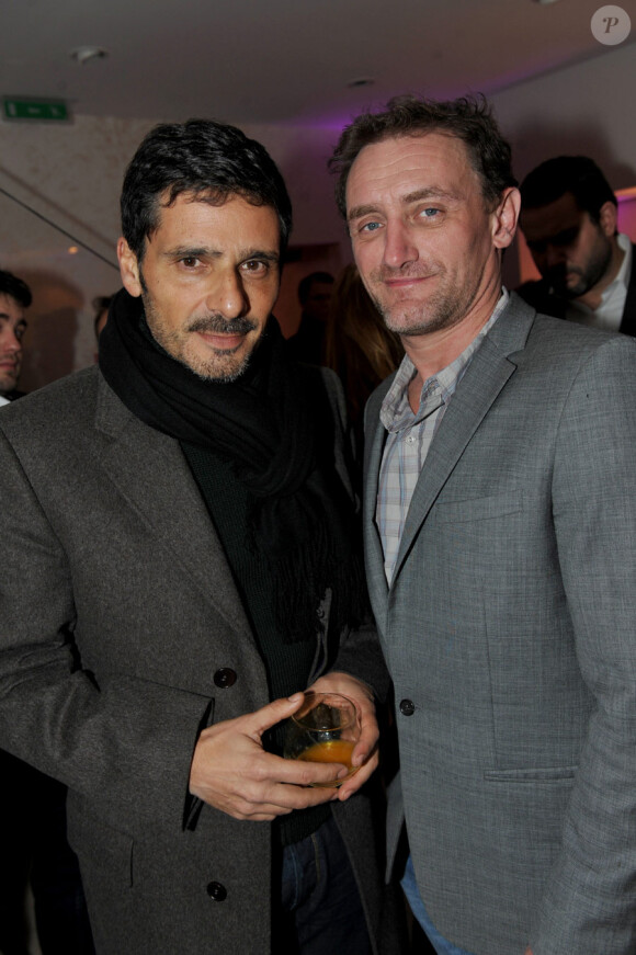 Pascal Elbé et Jean-Paul Rouve lors de la soirée du lancement de la collection Ladymatic de la maison Omega, dans la boutique des Champs-Elysées le 7 décembre 2010