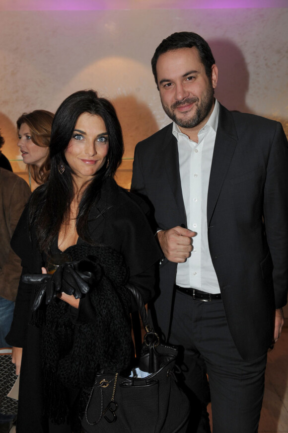 Pauline Delpech et Bruce Toussaint lors de la soirée du lancement de la collection Ladymatic de la maison Omega, dans la boutique des Champs-Elysées le 7 décembre 2010