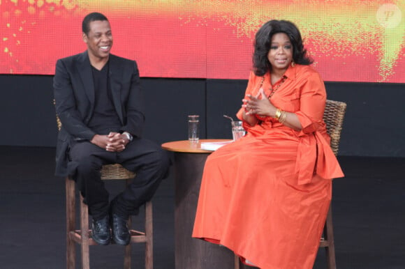 Oprah Winfrey lors de l'enregistrement de son émission en Australie le 13/12/10. Ici, avec Jay-Z