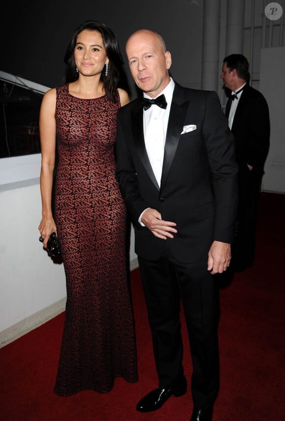 Bruce Willis et son épouse Emma Heming lors de l'after party des Golden Globes Weinstein Company au Beverly Hilton hotel de Los Angeles le 16 janvier 2011