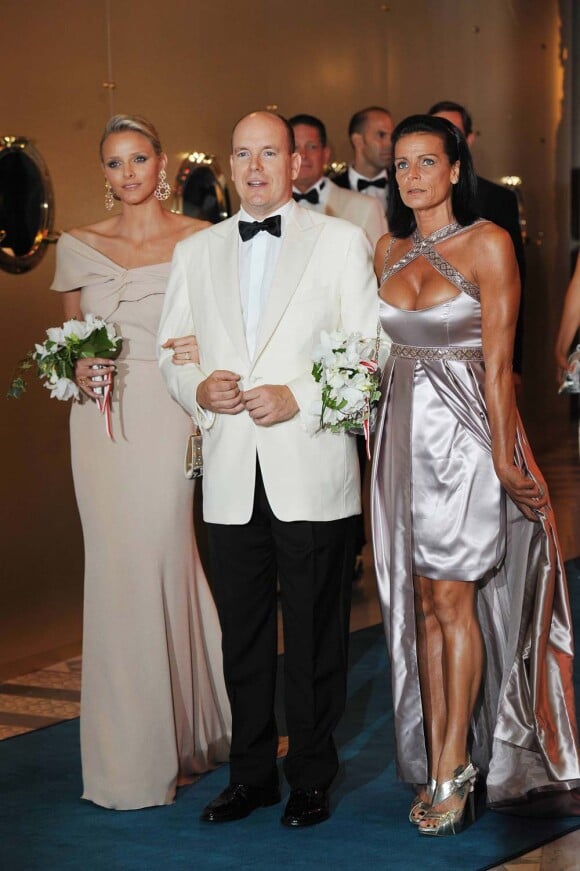 Stéphanie et Albert de Monaco et Charlene Wittstock, le 1er décembre 2010