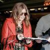 Fergie est à l'aéroport de New York. 6 avril 2011
