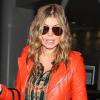 Fergie est à l'aéroport de New York. 6 avril 2011