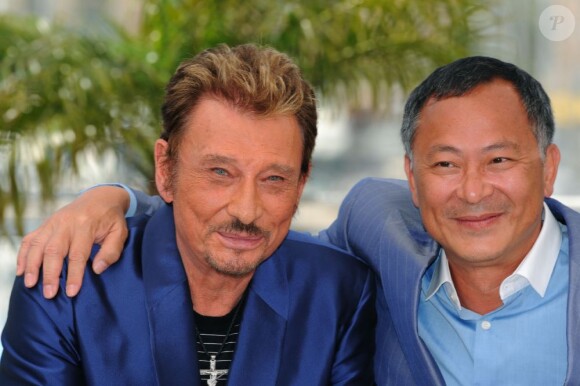 Johnnie To, ici avec Johnny Hallyday, sera membre du jury du 64e Festival de Cannes qui débute le 11 mai 2011