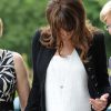 Carla Bruni-Sarkozy ne peut plus cacher sa grossesse et accueille les épouses des chefs d'Etat du G8 à la villa Strassburger à Deauville, le 26 mai 2011