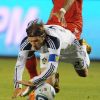 David Beckham chute durant le match L.A. Galaxy-Toronto FC le 11 juin 2011 à Los Angeles