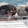 Katie Holmes profite de sa fille Suri Cruise durant la Fête des Pères aux côtés de son mari Tom Cruise à bord de leur bateau le Marquis le 19 juin 2011