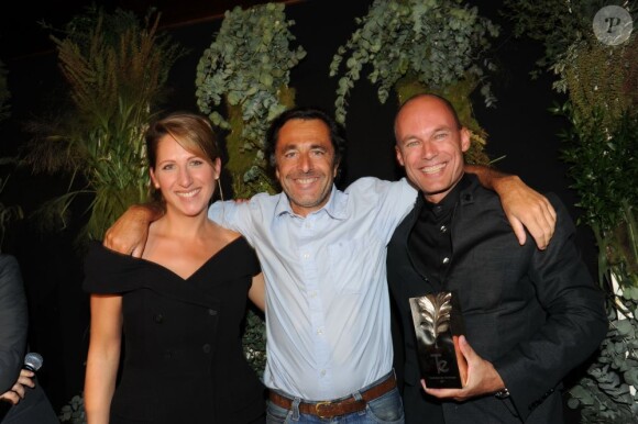 Maud Fontenoy, Nicolas Vannier et Bertrand Piccard à la première édition des trophées de l'écologie, le 20 juin 2011, à Paris.