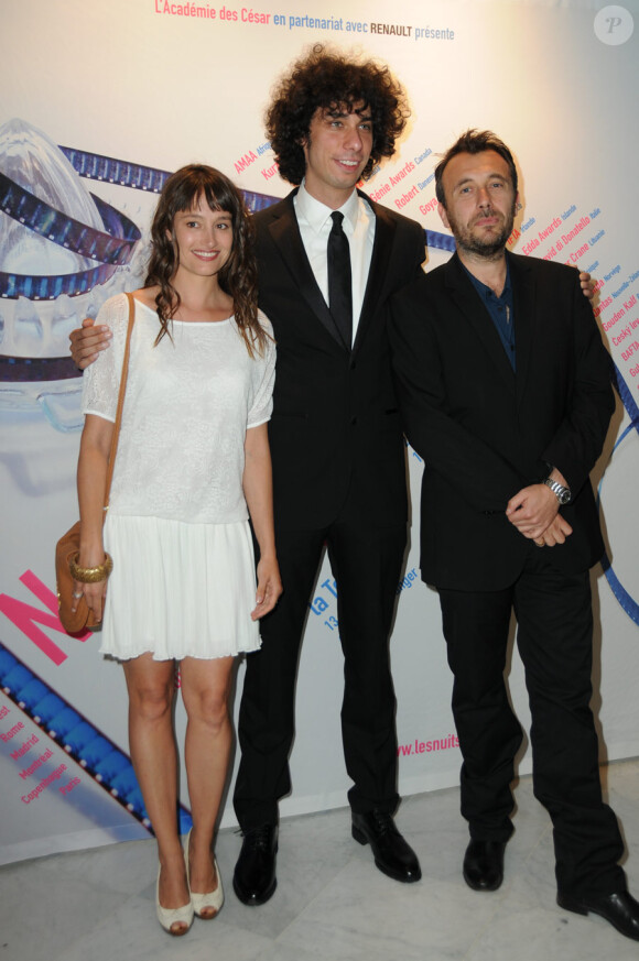 Marie Gillain, Luke Matheny et Fred Cavayé lors du dîner de gala des Nuits en or dans le quartier général de l'UNESCO à Paris le 6 juillet 2011