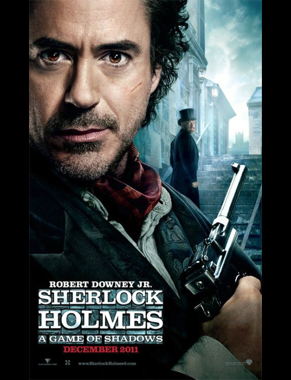 L'affiche du film Sherlock Holmes 2 avec Robert Downey Jr. et Jared Harris en arrière-plan