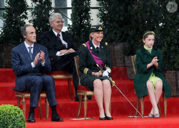 Le prince Lorenz, la princesse Astrid et leur fille Laetitia Maria lors des défilés de la fête nationale de Belgique, à Bruxelles le 21 juillet 2011