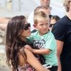 Wesley Sneijder en vacances à Saint Tropez le 26 juillet 2011 avec sa femme Yolanthe et leur fils