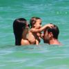 Adriana Lima en vacances à Miami avec son époux et sa fille Valentina le 31 juillet 2011