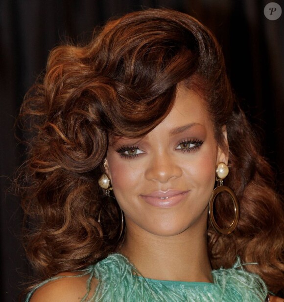 La belle Rihanna en pleine promotion de son parfum Reb'l Fleur, à Londres, le 19 août 2011