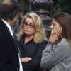 Catherine Deneuve et Chiara Mastroianni lors des obsèques de Raoul Ruiz à Paris le 23 août 2011