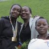 Audrey Tcheuméo partage son titre mondial fraîchement acquis avec sa maman et son jeune frère venus l'encourager pour ses premiers championnats du monde.