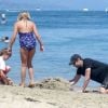 David Duchovny en juillet 2011 sur la plage à Malibu avec ses enfants