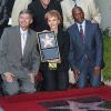 La légende du rock n'roll Buddy Holly recevait son étoile posthume sur le Walk of Fame d'Hollywood Boulevard le 7 septembre 2011, le jour où il aurait eu 75 ans, en présence notamment de sa veuve Maria Elena et de l'acteur Gary Busey, qui l'incarna dans The Buddy Holly Story.