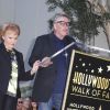 La légende du rock n'roll Buddy Holly recevait son étoile posthume sur le Walk of Fame d'Hollywood Boulevard le 7 septembre 2011, le jour où il aurait eu 75 ans, en présence notamment de sa veuve Maria Elena et de l'acteur Gary Busey, qui l'incarna dans The Buddy Holly Story.