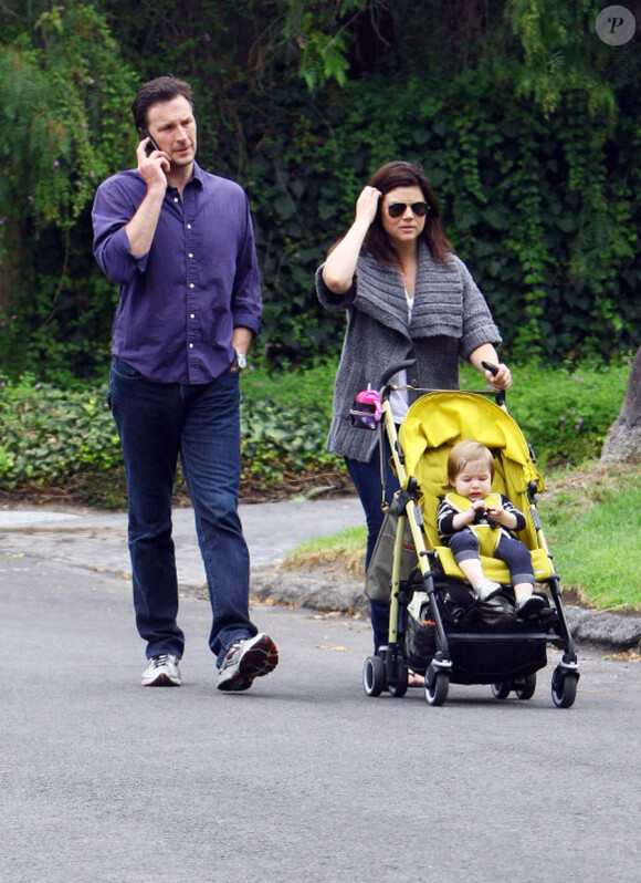 Tiffani Thiessen avec son mari Brady Smith et sa fille Harper, le 17 septembre 2011