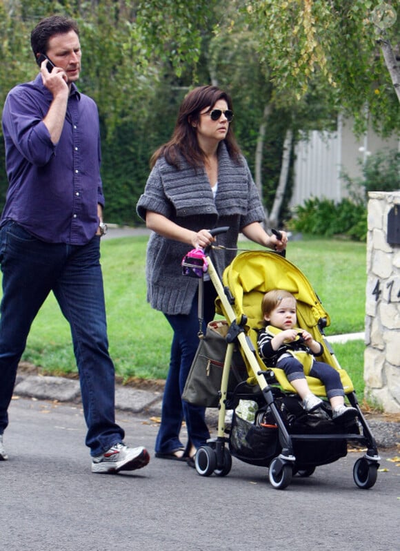 Tiffani Thiessen avec son mari Brady Smith et sa fille Harper, le 17 septembre 2011
