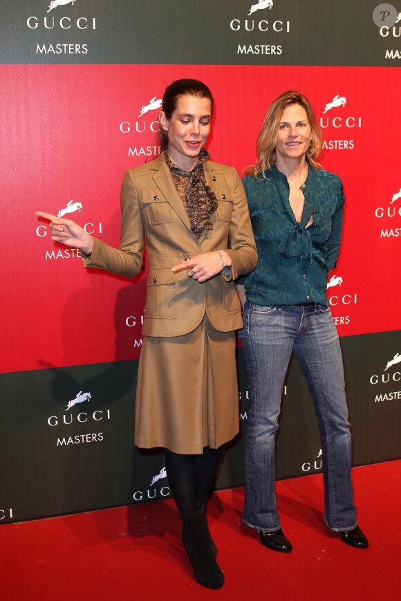Charlotte Casiraghi et Virginie Coupérie-Eiffel lors de la 3e édition des Gucci Masters, à Villepinte, le 1er décembre 2011.