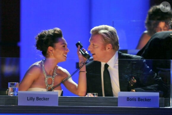 Boris Becker et son épouse lors du gala Ein Herz für Kinder, le 17 décembre 2011, à Berlin.