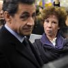Nicolas Sarkozy a salué Véronique Colucci en visite dans un centre des Restos du coeur parisien le 22 décembre 2011